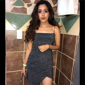 Very cute asymmetrical glittery black dress